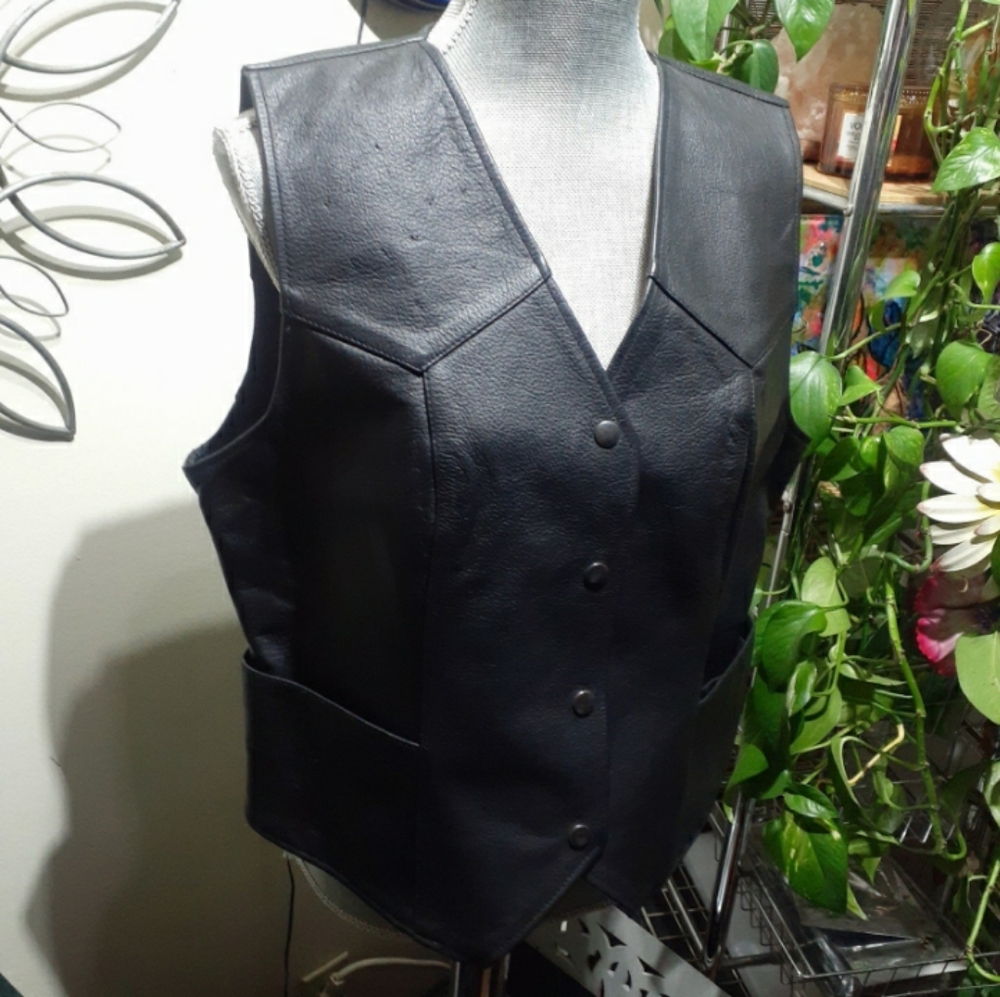 Genuine leather black biker type vest.  XL